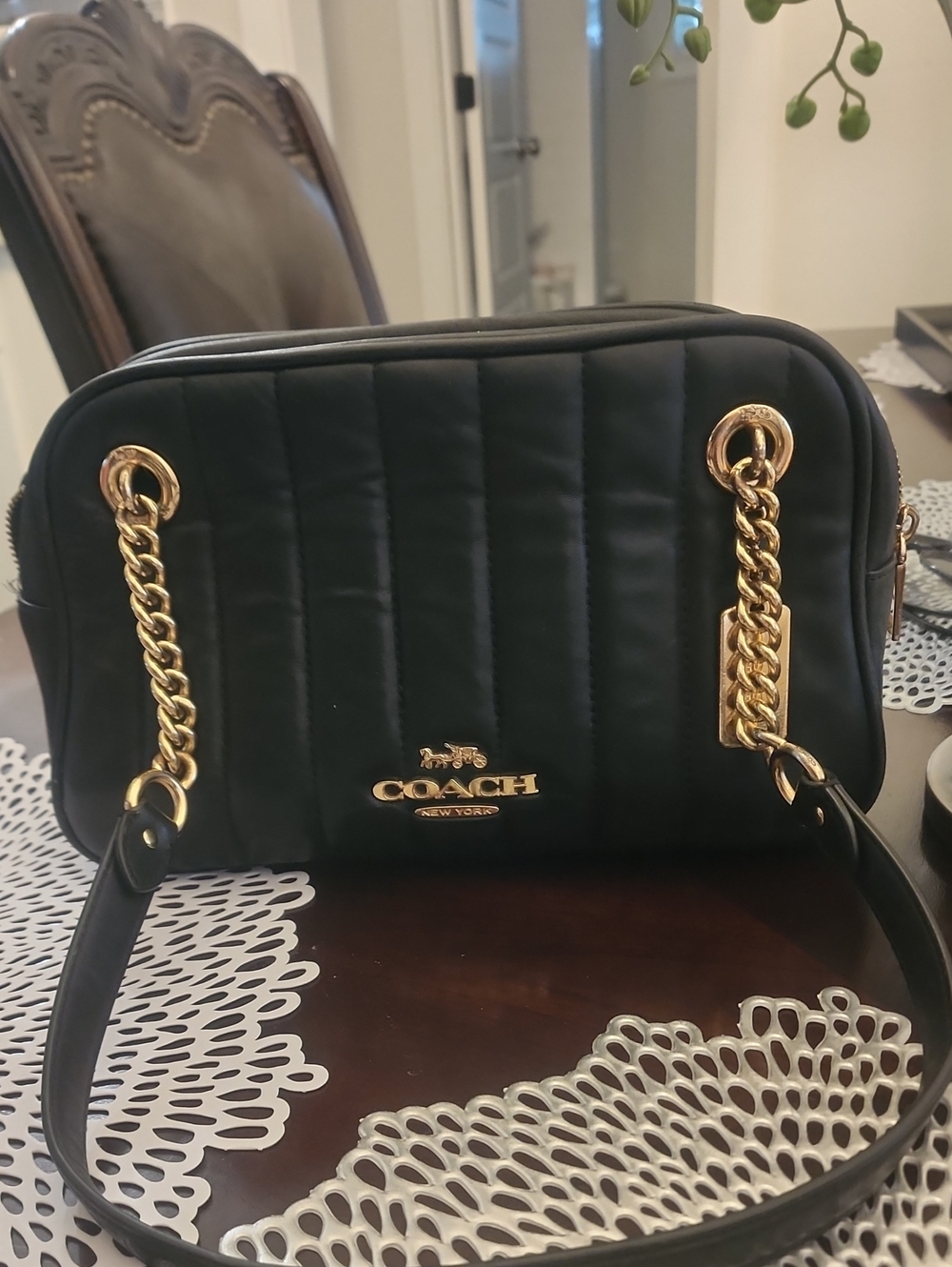 Coach Black Quilted Shoulder Bag with Gold Chain Accents
